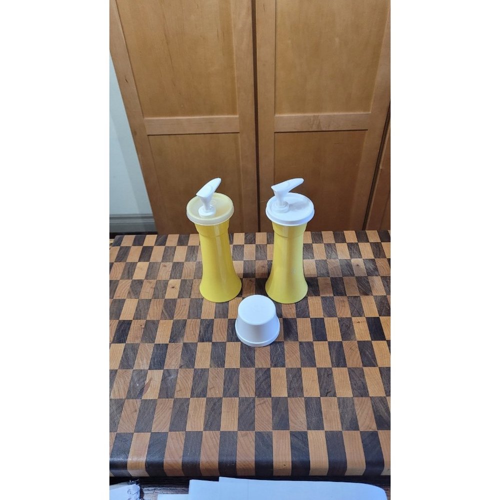 Tall yellow pumps 1 with cap.